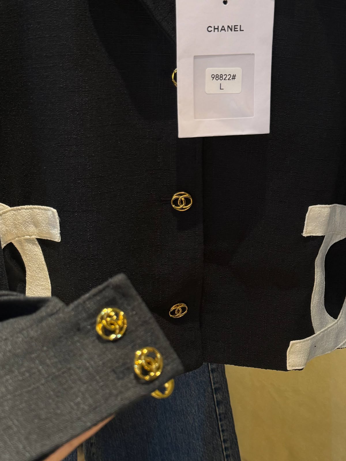 Chanel-style cropped black blazer