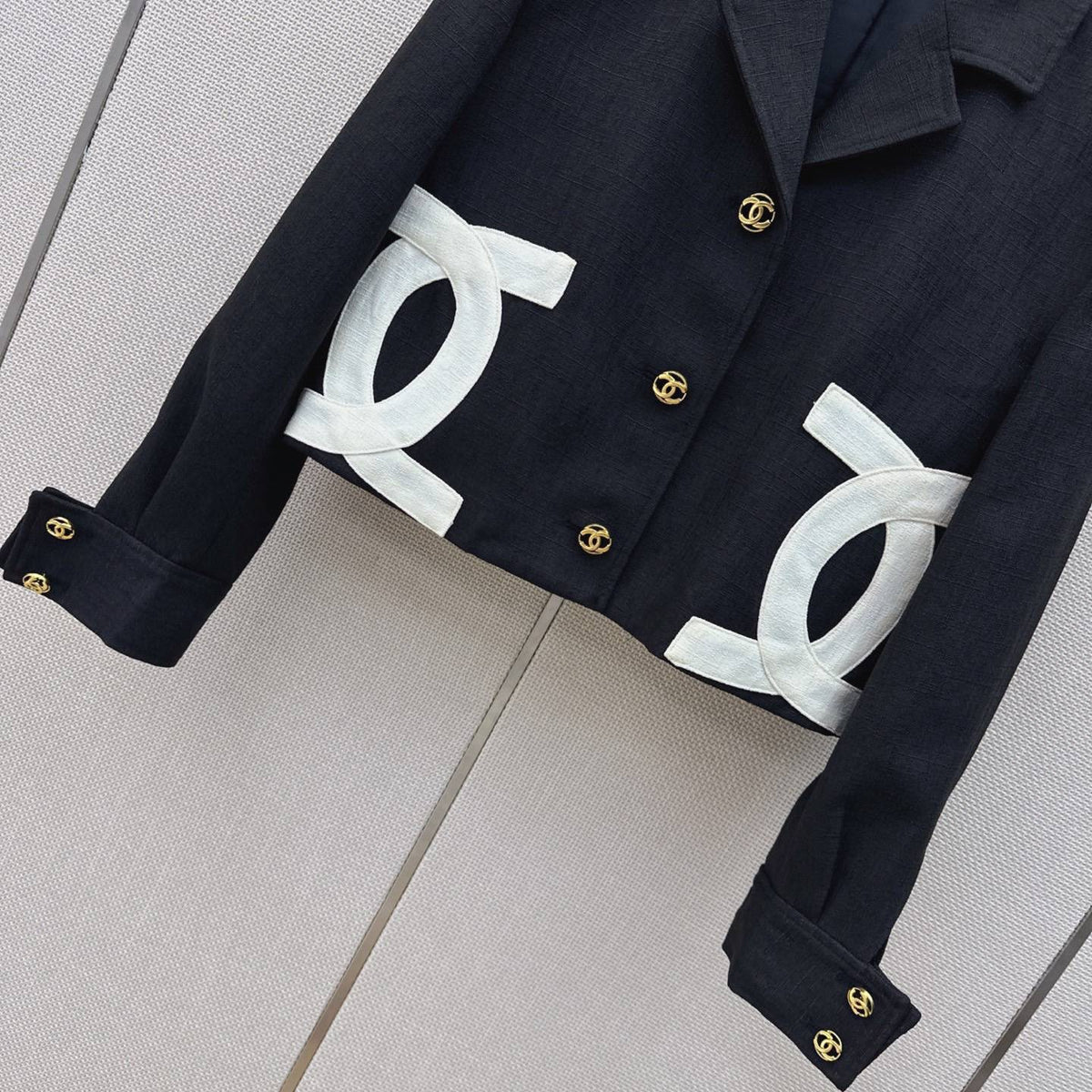 Chanel-style cropped black blazer