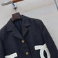 Chanel-style cropped black blazer