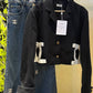 Chanel-style cropped black blazer