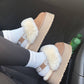 Brown UGG slippers