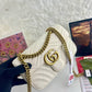 Gg marmont flap leather crossbody bag
