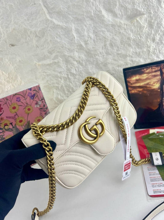 Gg marmont flap leather crossbody bag