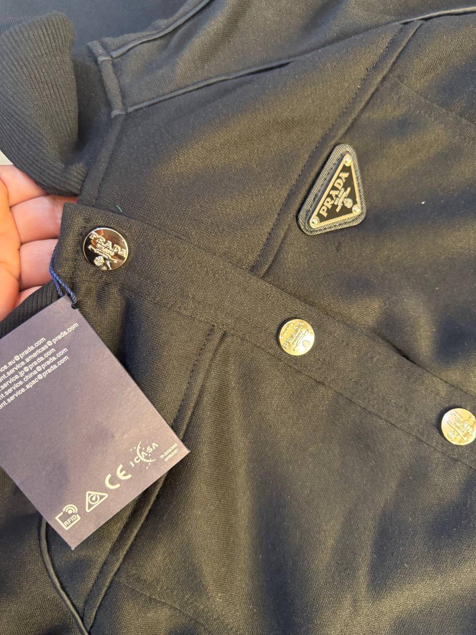 Elegant black Prada tracksuit