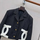 Chanel-style cropped black blazer