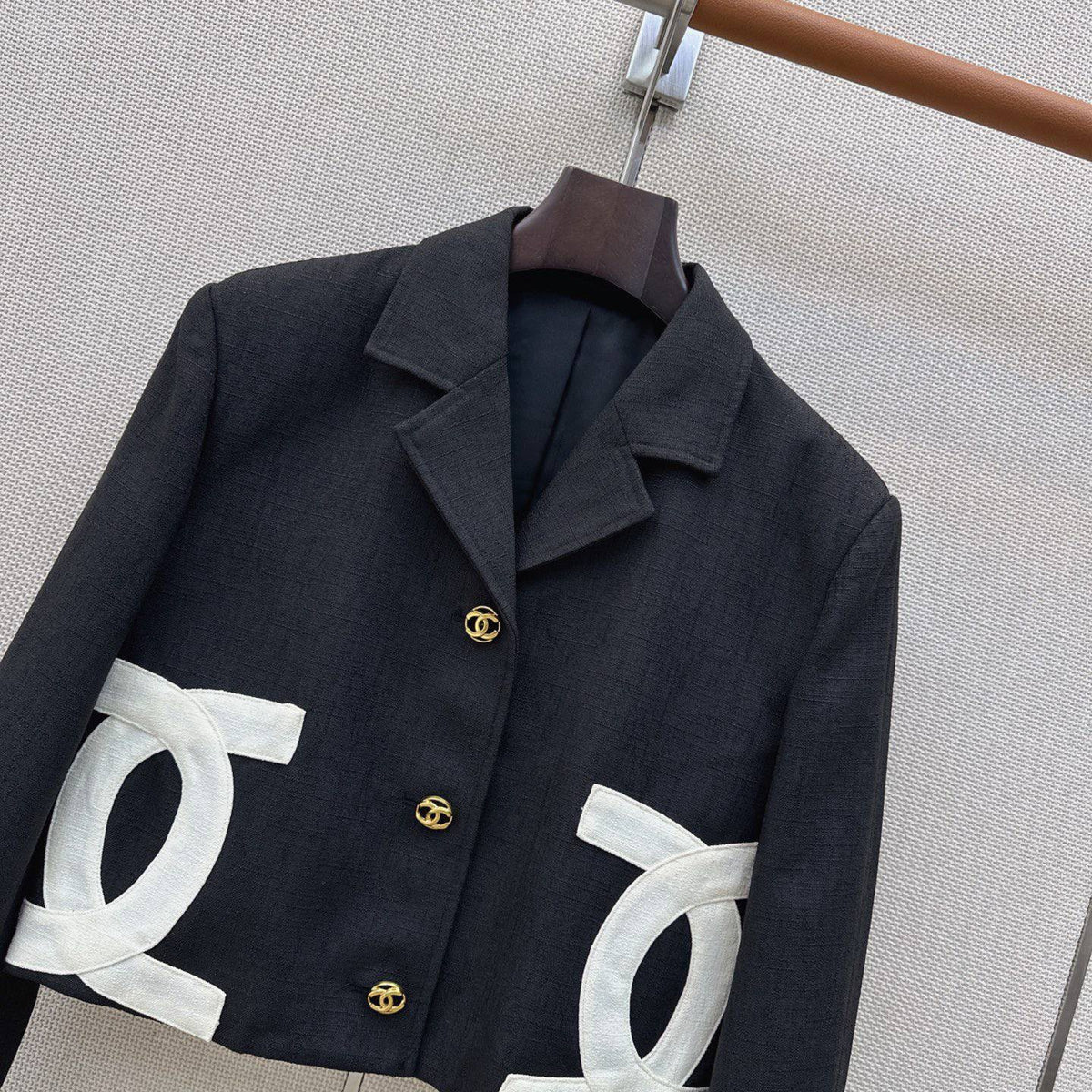 Chanel-style cropped black blazer